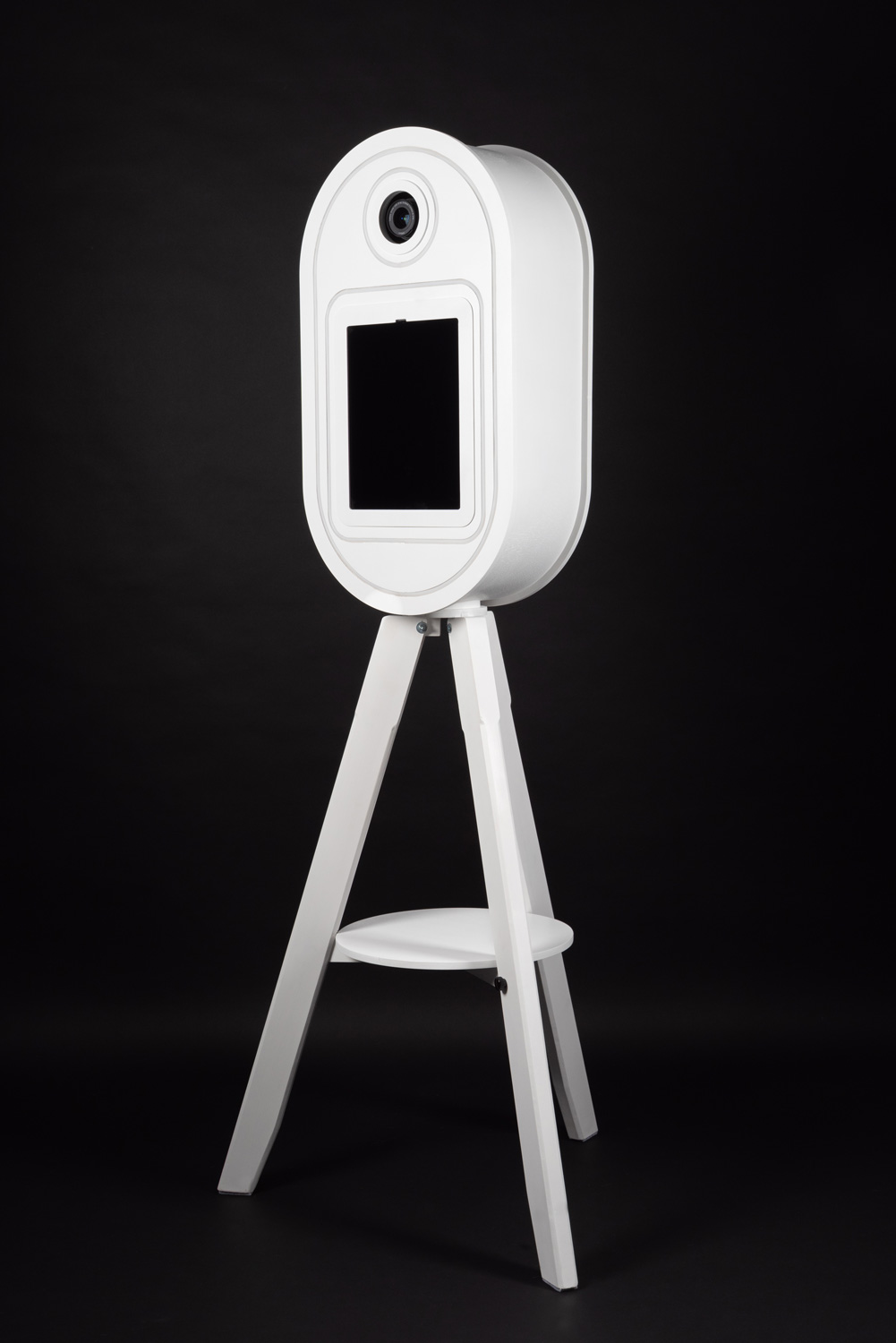 The side and front of Vintage Photo Booths V2 in white against a black background. Buy a vintage photo booth today