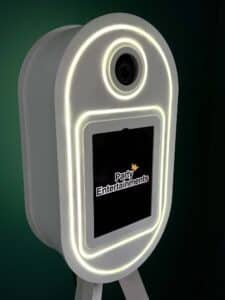 New white Vintage pod shown against a green wall with screen lit up.