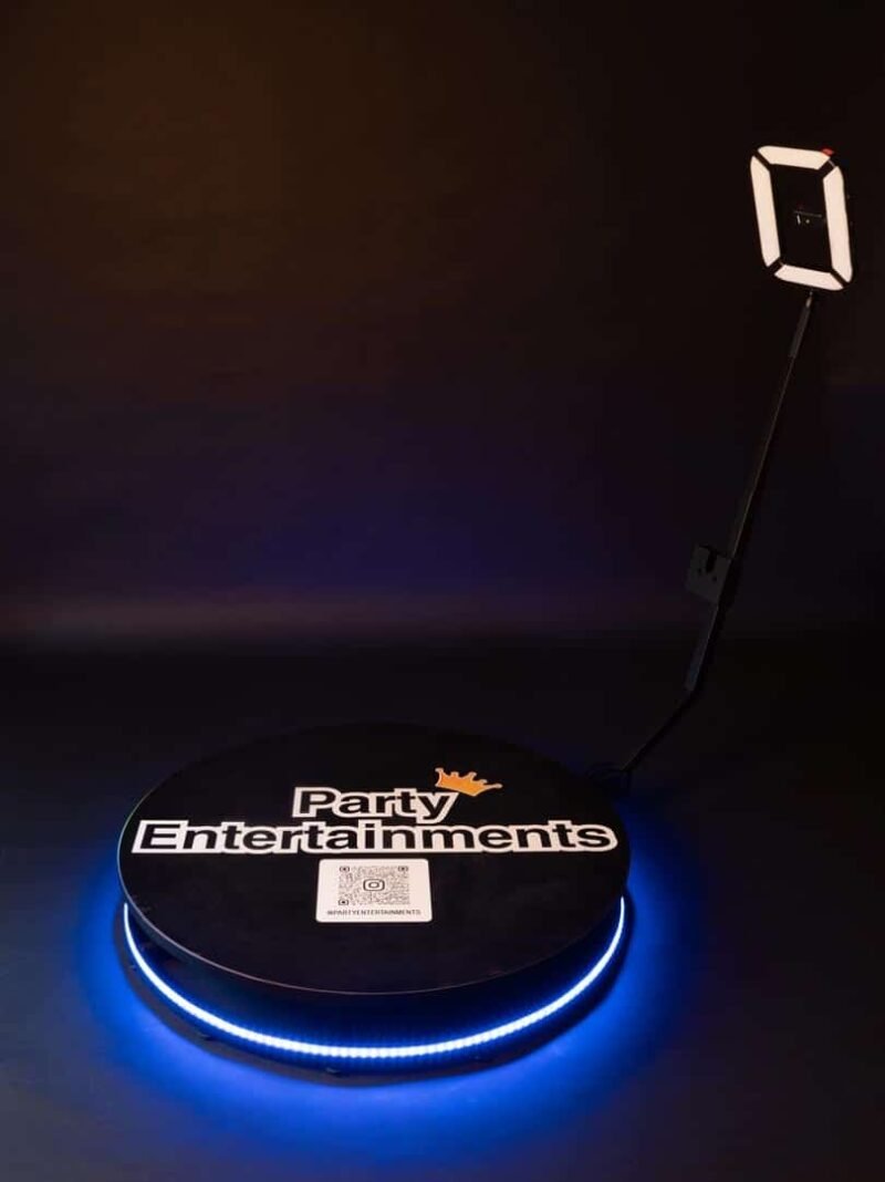 The 360 Photo Booth photographed in a studio with a black background