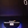 360 Photo Booths on a black background with a lit up Base