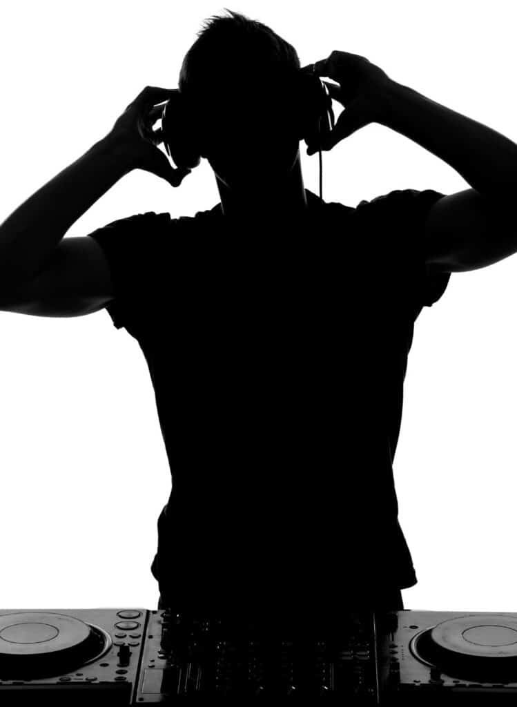 Black and white image of a DJ at the deck at Essex Event